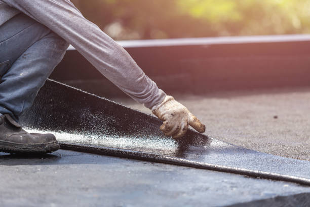 Professional Basement Waterproofing technician working in Milton, KY